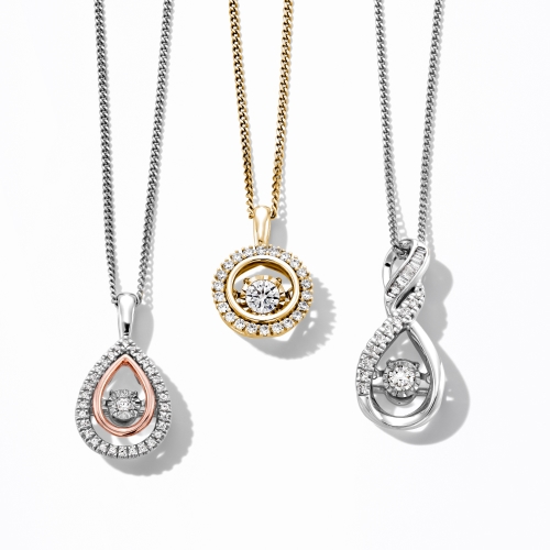 Image of three Unstoppable Love necklaces